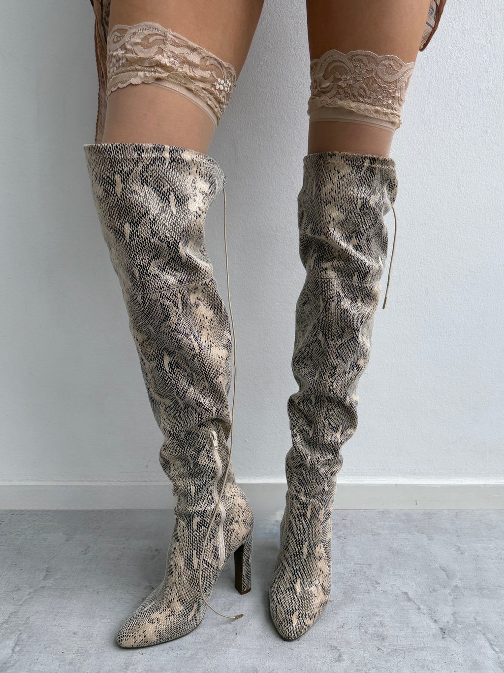 Snake skin print boots