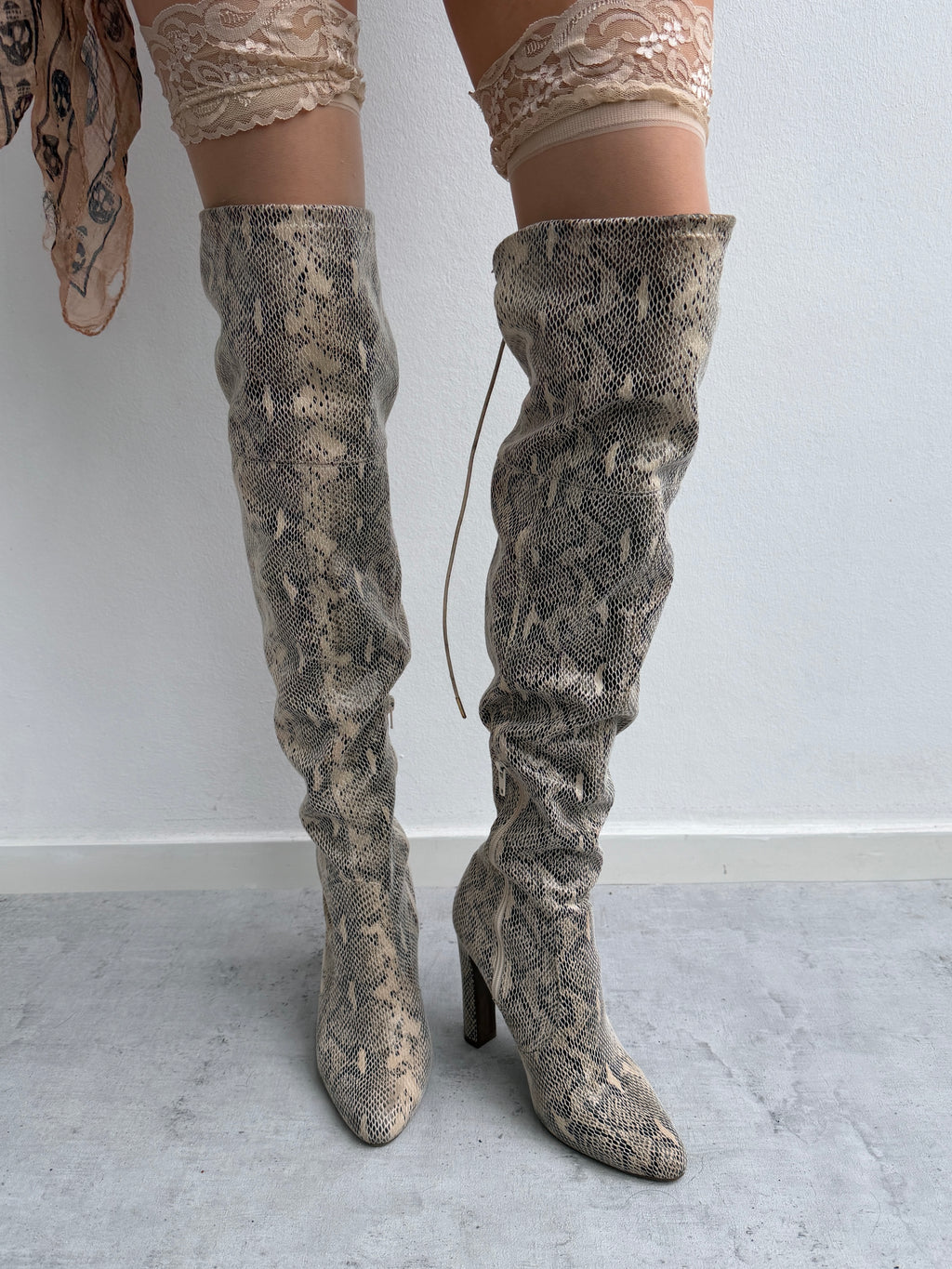 Snake skin print boots