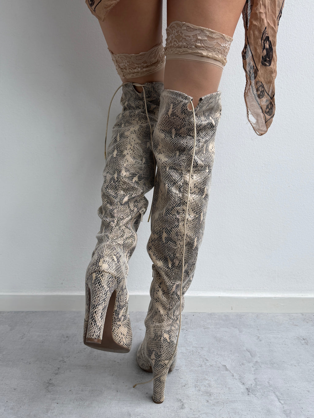 Snake skin print boots
