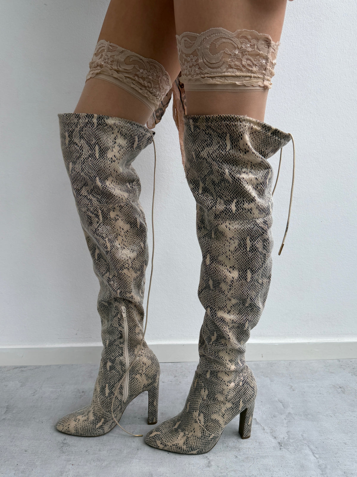 Snake skin print boots
