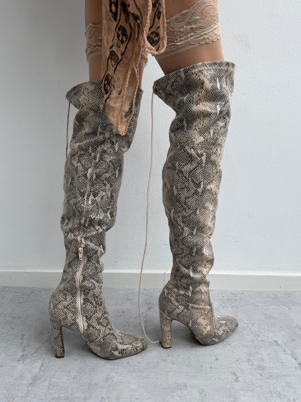 Snake skin print boots